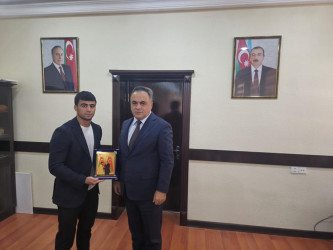 Goranboylu idmançı, XXXIII Yay Olimpiya Oyunlarında III yerin qalibi Həsrət Cəfərovla rayon  İcra Hakimiyyətində görüş keçirildi