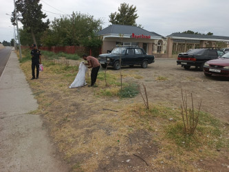 Goranboyda yol kənarında ağaclar suvarıldı, məişət tullantıları təmizləndi